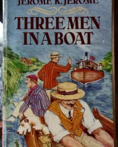 three men in boat